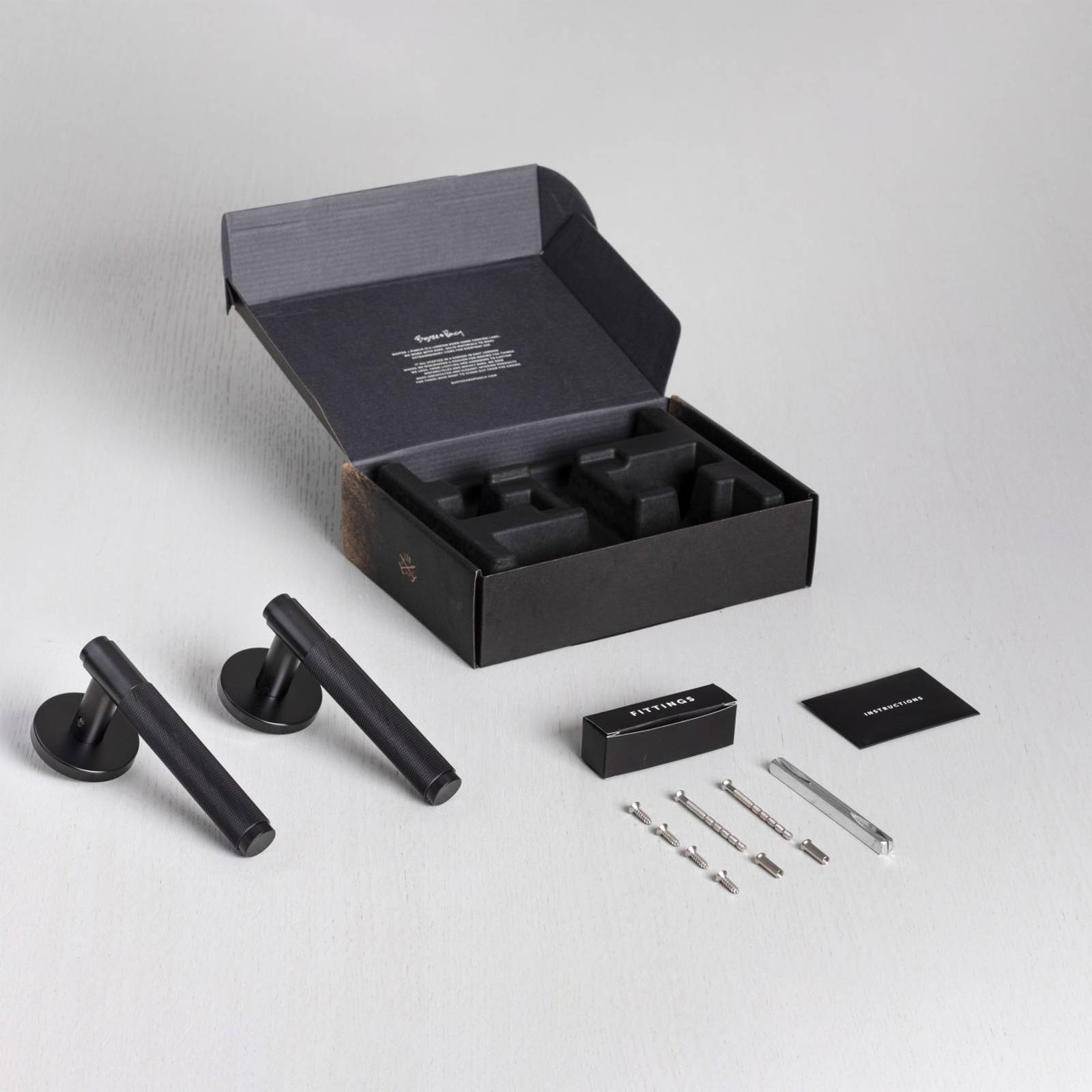 DOOR HANDLE SET / CROSS / SPRUNG