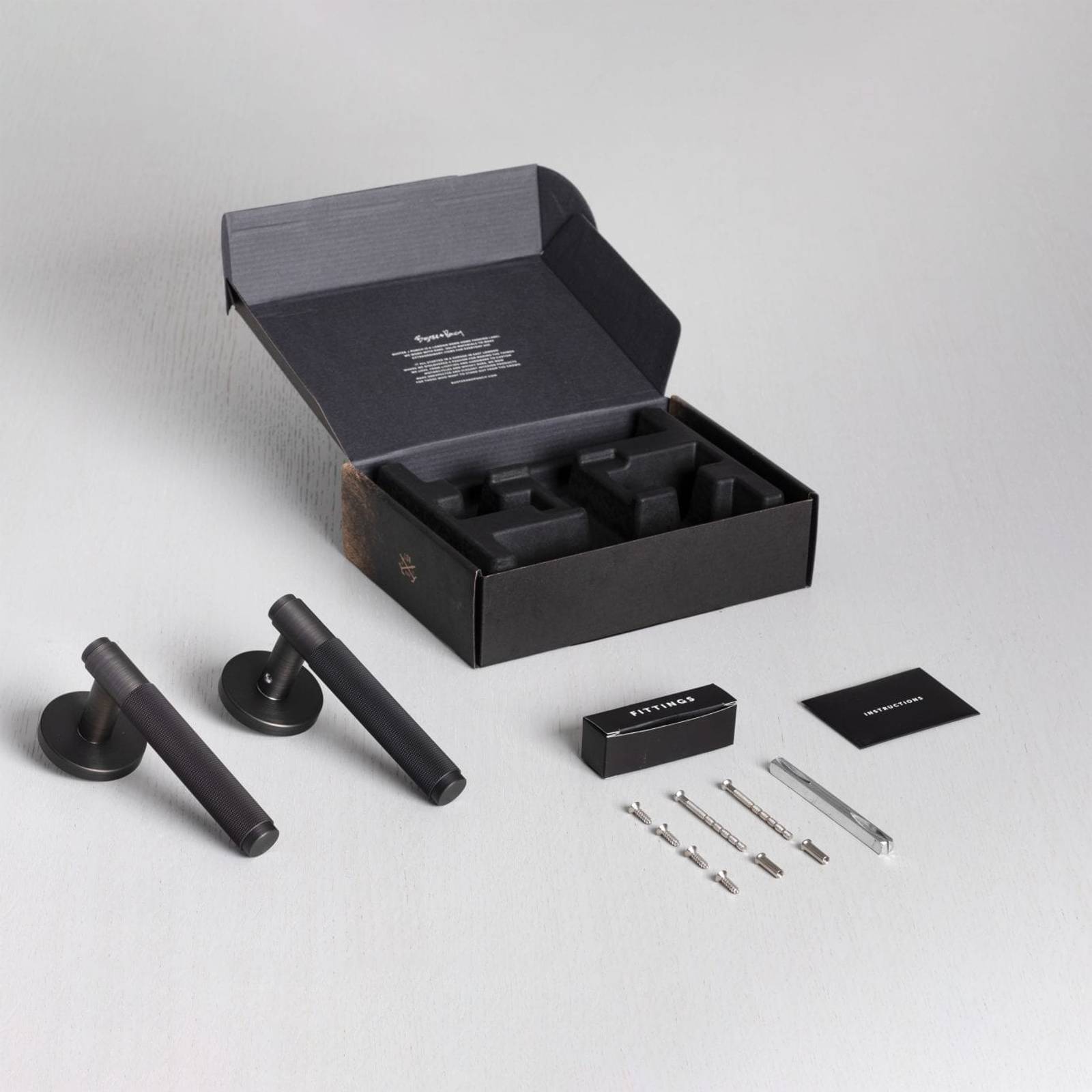 DOOR HANDLE SET / CROSS / SPRUNG